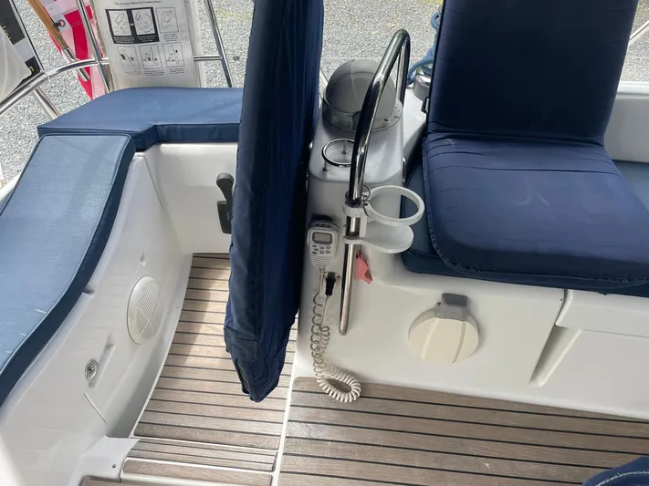 Kindred Spirit Yacht Photos Pics Cockpit of 2008 Jeanneau Sun Odyssey 45 DS with blue seating and marine equipment.