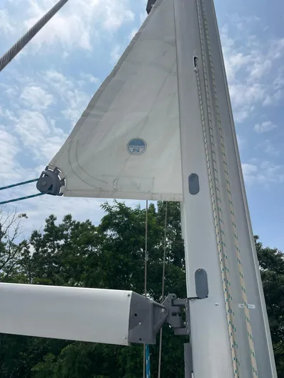 Kindred Spirit Yacht Photos Pics Sail of 2008 Jeanneau Sun Odyssey 45 DS against a clear sky.