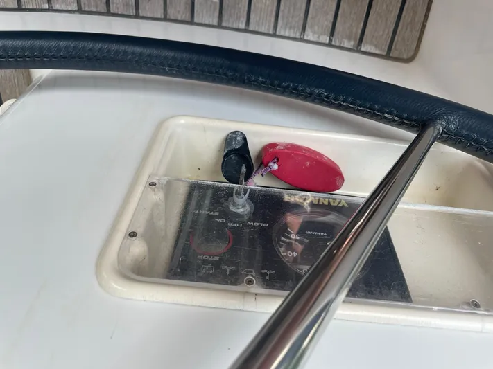 Kindred Spirit Yacht Photos Pics Control panel of 2008 Jeanneau Sun Odyssey 45 DS sailboat with steering wheel.