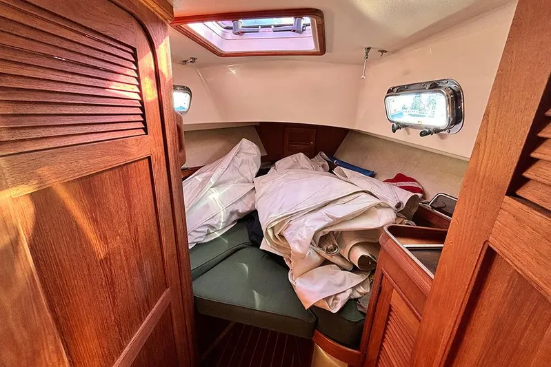 Butternut Yacht Photos Pics Cozy cabin interior of 1995 Island Packet 37 sailboat with stored sails.