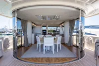 Luxurious dining area on 2016 Custom Line Navetta 28 yacht with elegant decor.