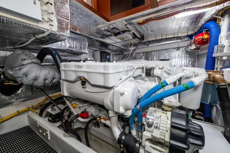 New Boat Hull #12 Yacht Photos Pics Engine room of 2024 Nordic Tug 40, showcasing modern marine engine and components.