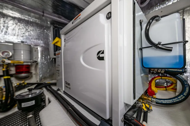 New Boat Hull #12 Yacht Photos Pics Engine room of 2024 Nordic Tug 40 with Onan generator and equipment.