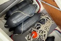Storage compartment on a 2017 Beneteau Swift Trawler 30 with fenders and ropes.