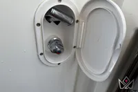 Outdoor shower compartment on a 2017 Beneteau Swift Trawler 30 boat.
