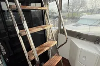 2017 Beneteau Swift Trawler 30 interior with wooden stairs and modern design.