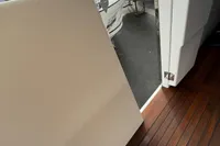 2017 Beneteau Swift Trawler 30, wooden deck, open door, outdoor view.