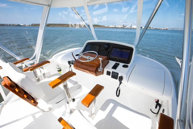 One More Yacht Photos Pics Flybridge of 2018 Bertram 35 Sportfish with dual seats and navigation controls.