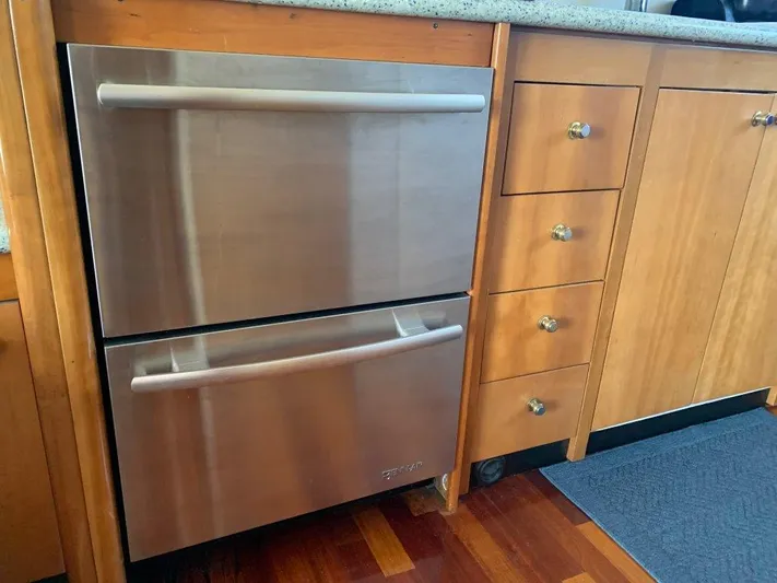  Yacht Photos Pics Stainless steel double drawer refrigerator in Carver 450 Voyager Pilothouse kitchen, 2002 model.