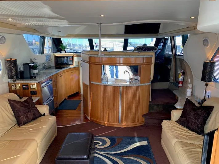  Yacht Photos Pics Luxurious interior of 2002 Carver 450 Voyager Pilothouse yacht with modern amenities.