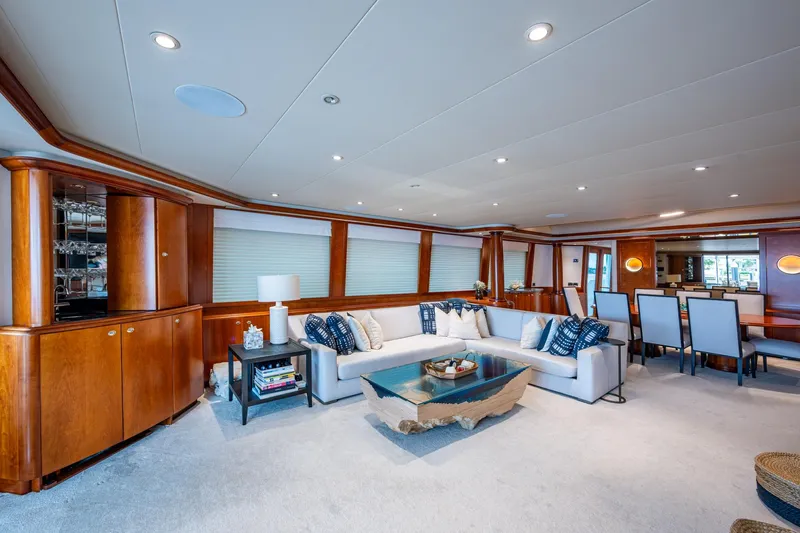 Lila Cuy Yacht Photos Pics Luxurious interior of 2006 Westport 112 yacht with elegant seating and dining area.