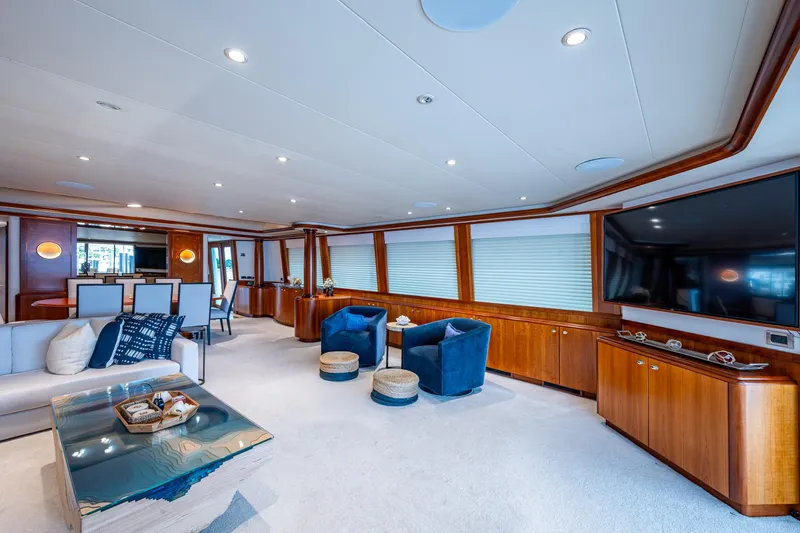 Lila Cuy Yacht Photos Pics Luxurious interior of 2006 Westport 112 yacht with elegant seating and modern decor.