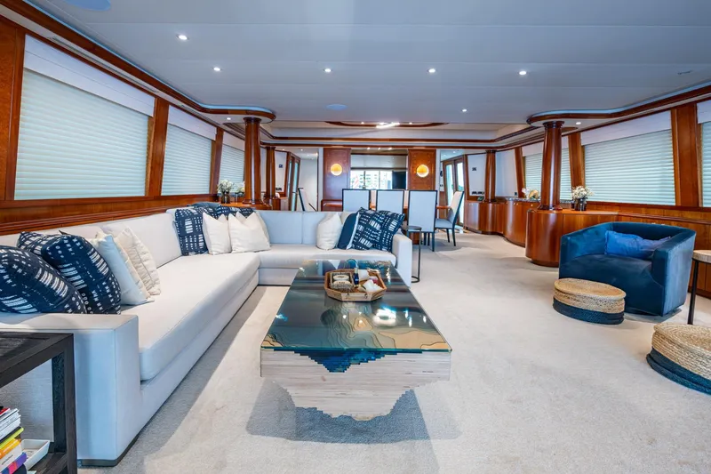 Lila Cuy Yacht Photos Pics Luxurious interior of 2006 Westport 112 yacht with elegant seating and modern decor.