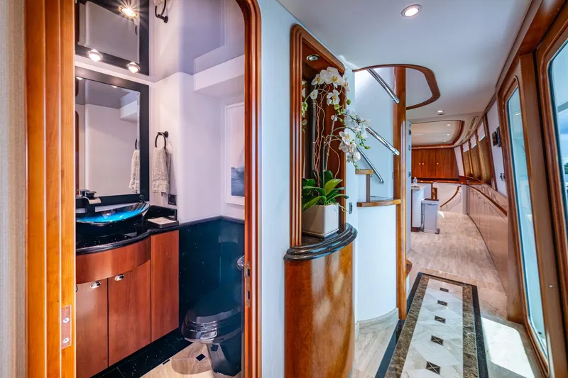 Lila Cuy Yacht Photos Pics Luxurious interior of 2006 Westport 112 yacht featuring elegant bathroom and hallway design.