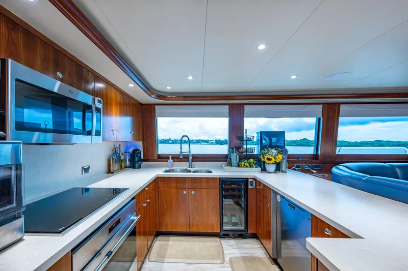 Lila Cuy Yacht Photos Pics Luxurious kitchen interior on 2006 Westport 112 yacht with modern appliances and ocean view.