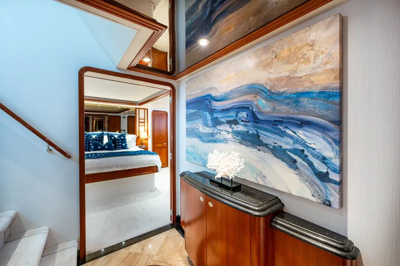 Lila Cuy Yacht Photos Pics Luxurious interior of 2006 Westport 112 yacht with modern art and elegant bedroom.