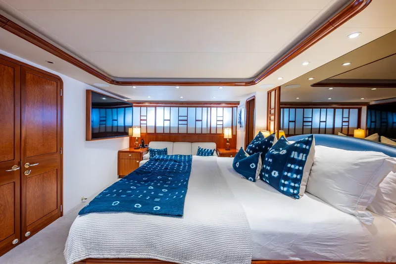 Lila Cuy Yacht Photos Pics Luxurious 2006 Westport 112 yacht bedroom with elegant decor and modern amenities.
