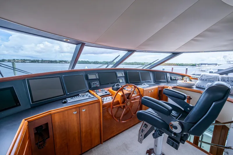 Lila Cuy Yacht Photos Pics Luxurious 2006 Westport 112 yacht helm with modern navigation equipment and panoramic views.