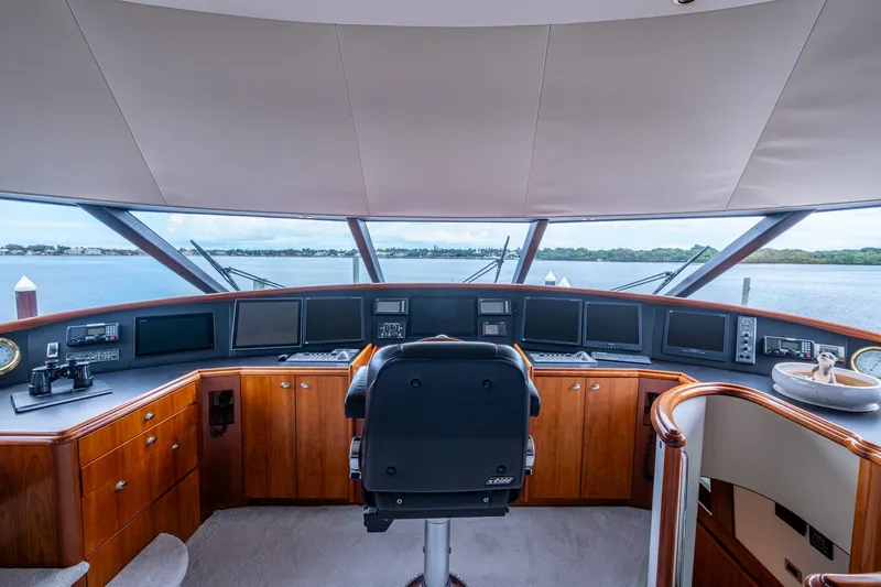 Lila Cuy Yacht Photos Pics Helm of 2006 Westport 112 yacht with panoramic view and modern navigation equipment.