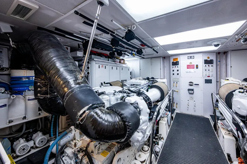 Lila Cuy Yacht Photos Pics Engine room of a 2006 Westport 112 yacht, featuring advanced machinery and equipment.