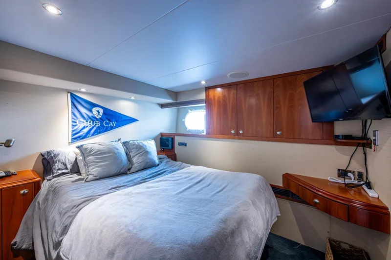 Lila Cuy Yacht Photos Pics Luxurious bedroom interior on 2006 Westport 112 yacht with cozy bed and modern amenities.