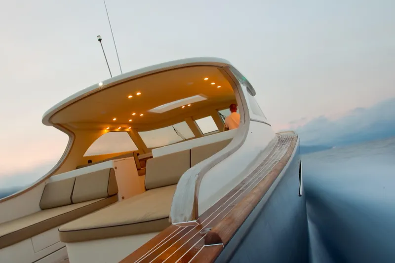 51 Yacht Photos Pics Luxurious Toy 51 yacht cruising at sunset, 2025 model, elegant interior lighting.