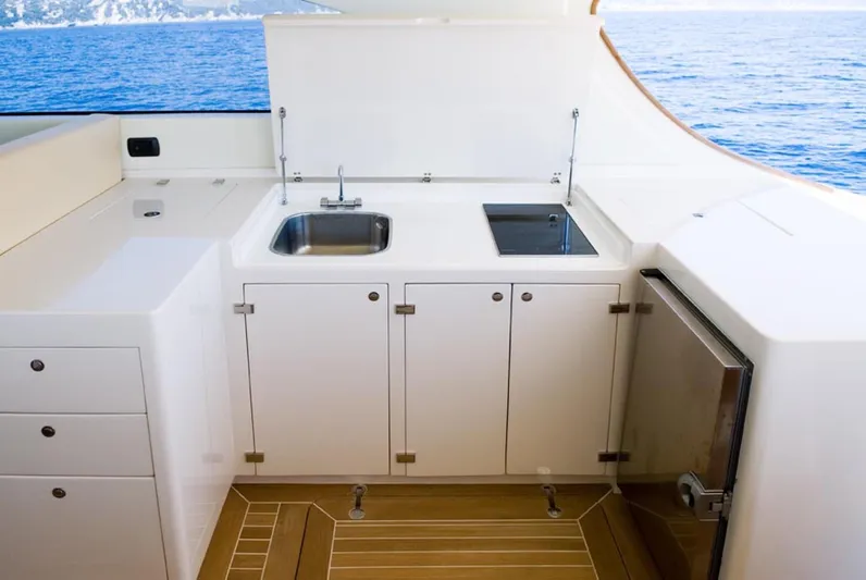 51 Yacht Photos Pics Modern yacht kitchen with sink, stove, and ocean view, Toy 51 model, 2025.