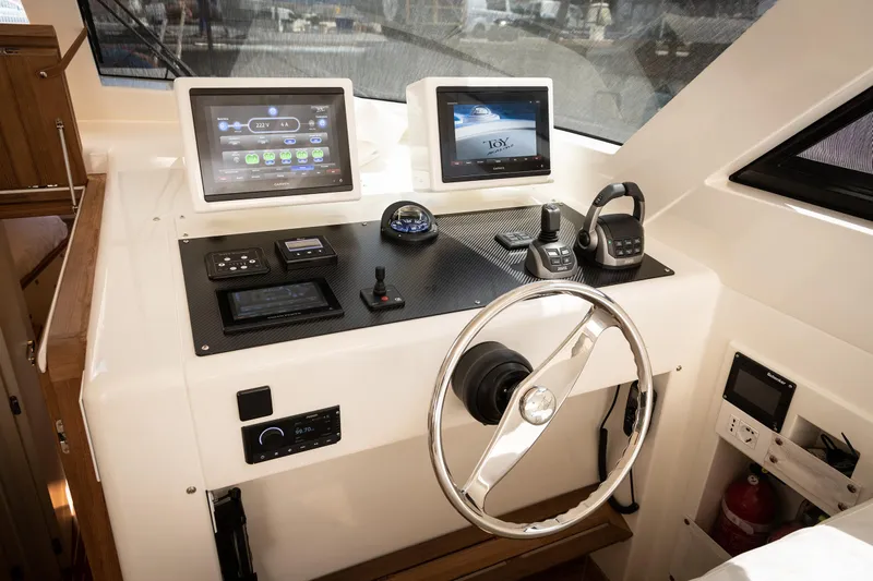 51 Yacht Photos Pics Modern boat cockpit with advanced navigation systems, Toy 51 model, 2025.