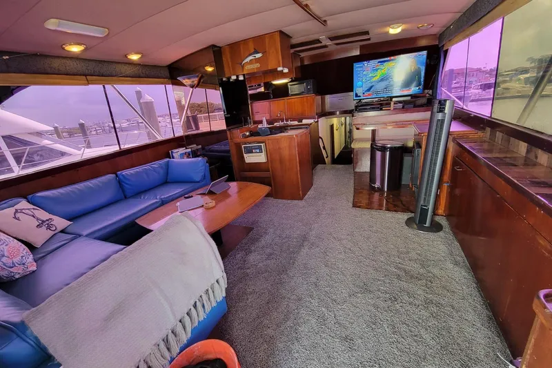  Yacht Photos Pics Interior of 1985 Ocean Yachts 55 Super Sport with blue seating and modern amenities.