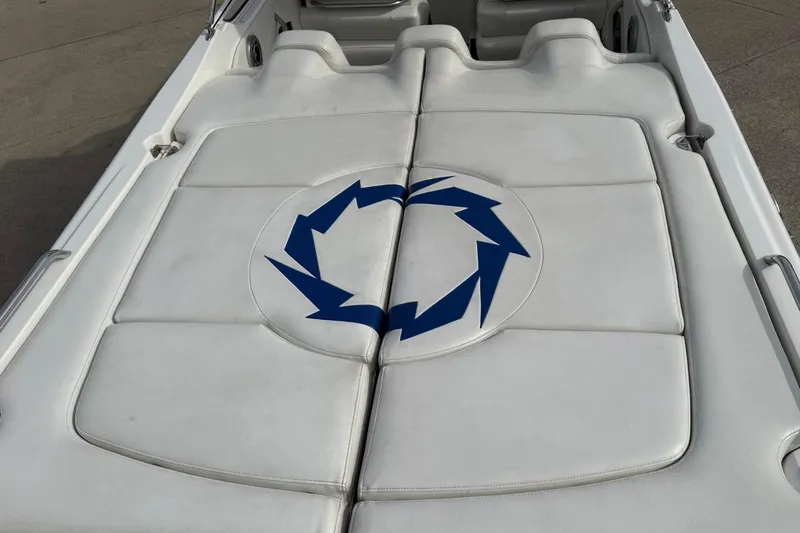  Yacht Photos Pics 2010 Fountain 42 Lightning boat with white seating and blue logo design.