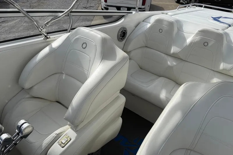  Yacht Photos Pics Interior of 2010 Fountain 42 Lightning boat with white leather seating.