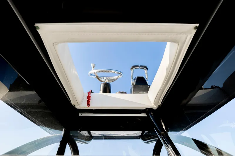  Yacht Photos Pics 2014 SeaHunter 32 Tournament boat helm view through open hatch.