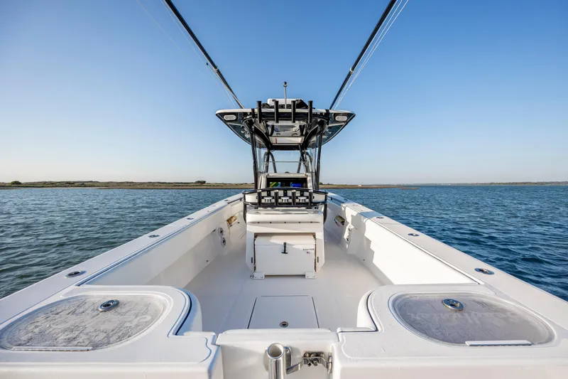  Yacht Photos Pics 2014 SeaHunter 32 Tournament boat on open water, clear sky, spacious deck.