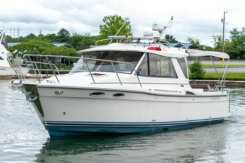  Yacht Photos Pics 2020 Cutwater C28 boat on calm water, featuring sleek design and modern amenities.