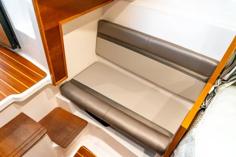  Yacht Photos Pics 2020 Cutwater C28 interior seating with wooden accents and modern design.