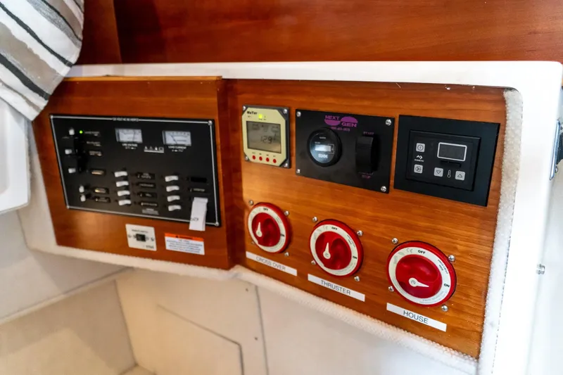  Yacht Photos Pics Control panel of a 2020 Cutwater C28 boat with switches and gauges.