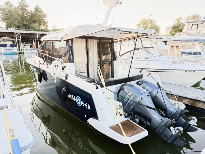  Yacht Photos Pics 2021 Jeanneau NC 895 boat docked with twin outboard motors.