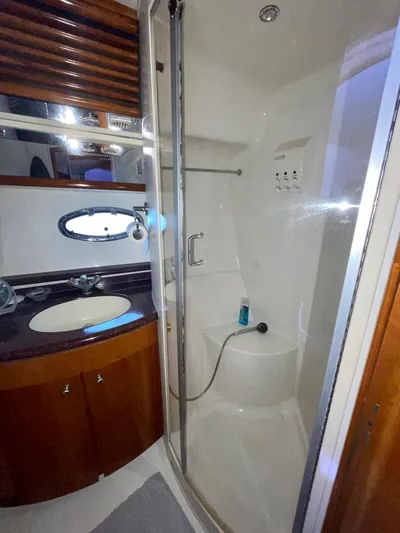  Yacht Photos Pics Bathroom interior of 2000 Carver 45 Voyager yacht with shower and sink.