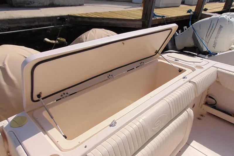 Fore Reel Yacht Photos Pics Open storage compartment on 2008 Grady-White Canyon 336 boat at dock.