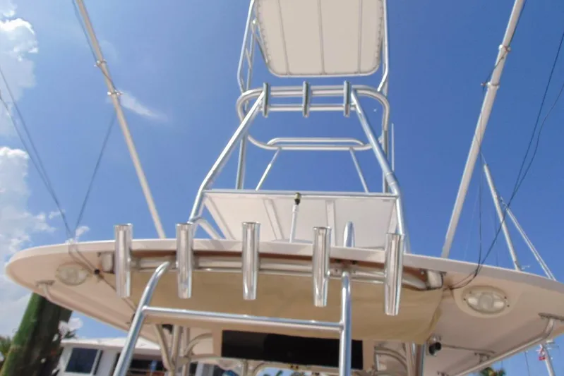 Fore Reel Yacht Photos Pics 2008 Grady-White Canyon 336 boat tower against clear blue sky.