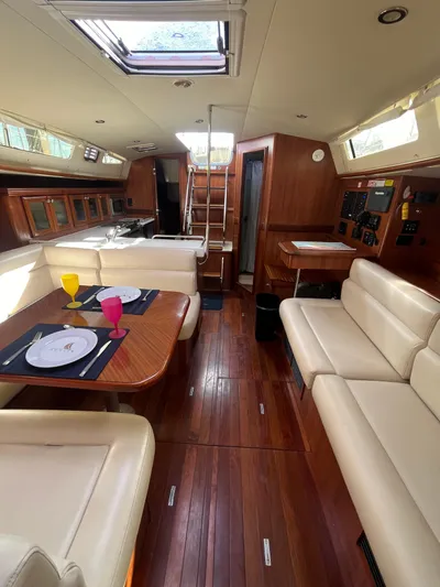 Pegasus Yacht Photos Pics Interior of 2015 Marlow-Hunter 40 yacht with elegant wood finish and cozy seating.