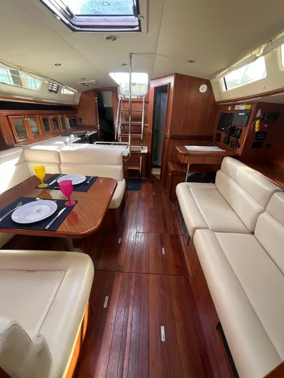 Pegasus Yacht Photos Pics Luxurious 2015 Marlow-Hunter 40 yacht interior with elegant wood finish and comfortable seating.