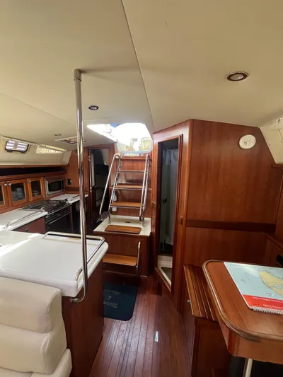Pegasus Yacht Photos Pics Interior of 2015 Marlow-Hunter 40 yacht with wooden finishes and modern amenities.