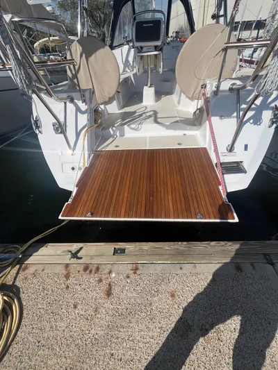 Pegasus Yacht Photos Pics 2015 Marlow-Hunter 40 sailboat with teak swim platform at marina dock.