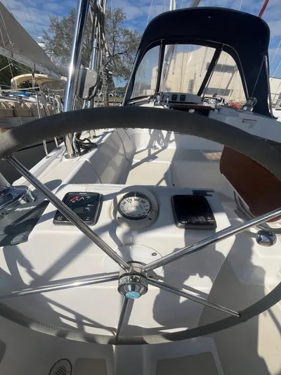 Pegasus Yacht Photos Pics Steering wheel and controls of a 2015 Marlow-Hunter 40 sailboat cockpit.