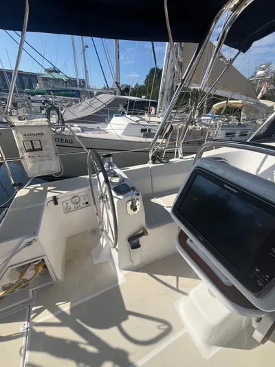 Pegasus Yacht Photos Pics Cockpit of 2015 Marlow-Hunter 40 sailboat with steering wheel and navigation equipment.