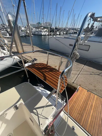Pegasus Yacht Photos Pics Sailboat docked at marina, Marlow-Hunter 40, 2015 model, with wooden deck and railing.