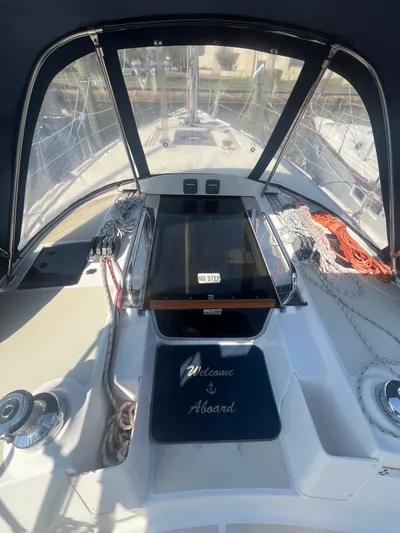 Pegasus Yacht Photos Pics Cockpit of 2015 Marlow-Hunter 40 sailboat with "Welcome Aboard" mat and ropes.