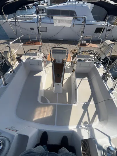 Pegasus Yacht Photos Pics 2015 Marlow-Hunter 40 sailboat cockpit with dual steering wheels, docked at marina.