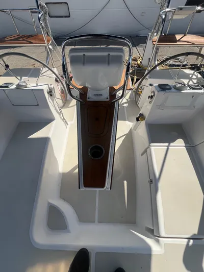 Pegasus Yacht Photos Pics Cockpit of 2015 Marlow-Hunter 40 sailboat with dual steering wheels and teak accents.